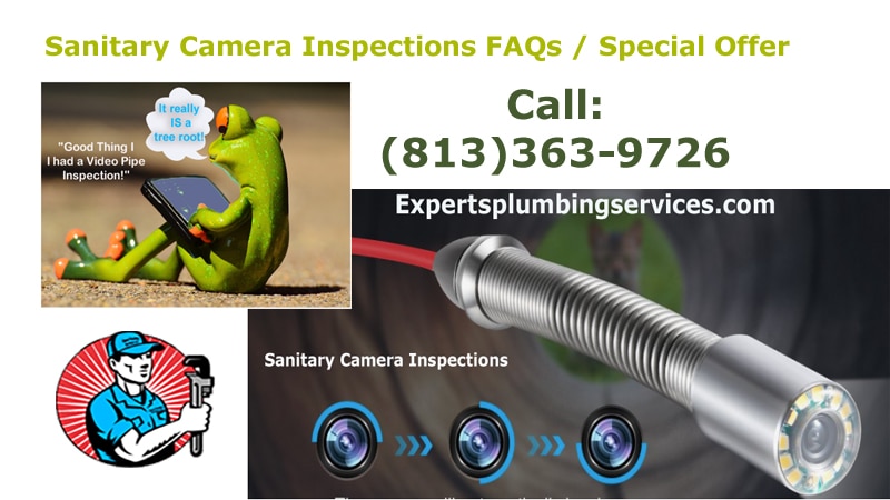 Plumber inspecting pipes with camera equipment